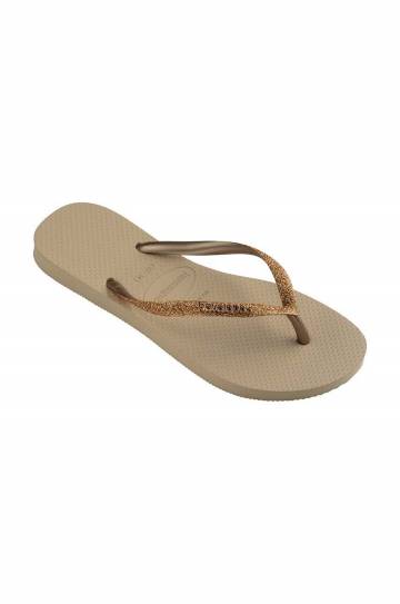 Вьетнамки Havaianas SLIM GLITTER II женские цвет золотой на плоском ходу 4146975.9177 Вьетнамки Havaianas SLIM GLITTER II женские цвет золотой на плоском ходу 4146975.9177
