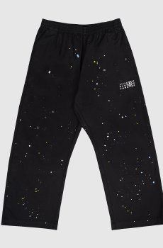 Детские черные брюки в принт в виде пятен краски
