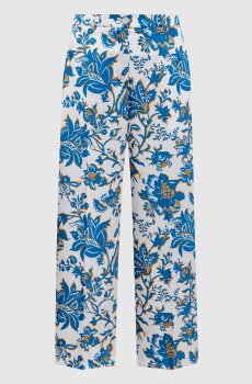 Белые брюки в принт