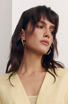 Золотисті сережки металік круглої форми