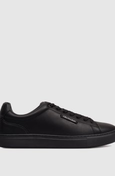 Черные кожаные кеды с нашивкой логотипа