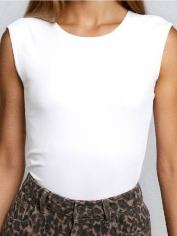 Комбінезон типу боді дівчачий - кремовий Комбінезон типу боді дівчачий - кремовий