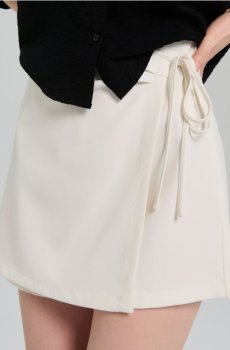 Спідниця-шорти з декоративними завязками - кремовий
