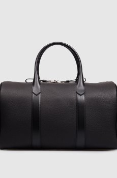 Черная кожаная дорожная сумка