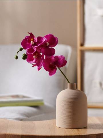 Декоративна штучна рослина - пурпуровий