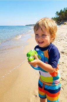 Іграшка – Водяний пістолет у формі динозавра на батарейках - різнобарвний