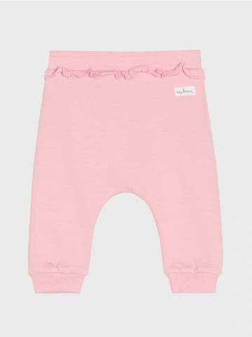 Штани з декоративним воланом на талії - рожевий