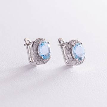 Серебряные серьги с голубыми топазами и фианитами 121389 Серебряные серьги с голубыми топазами и фианитами 121389