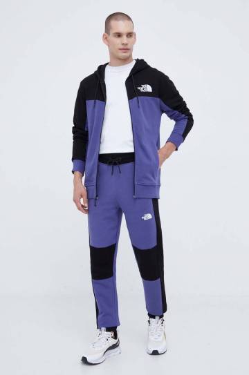 Хлопковые спортивные штаны The North Face цвет фиолетовый с узором Хлопковые спортивные штаны The North Face цвет фиолетовый с узором