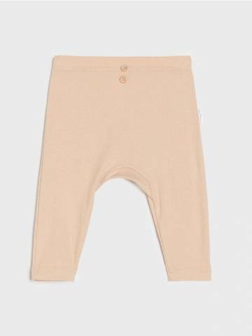 Штани з трикотажу в рубчик - бежевий