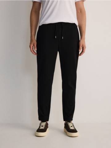 Reserved - Штани slim fit з палітуркою - чорний - 2184W-99X Reserved - Штани slim fit з палітуркою - чорний - 2184W-99X