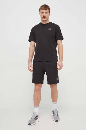 Хлопковая футболка Puma мужской цвет чёрный однотонный Хлопковая футболка Puma мужской цвет чёрный однотонный