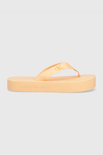 Вьетнамки Calvin Klein Jeans FLATFORM FLIPFLOP JELLY женские цвет оранжевый на плоском ходу YW0YW01398 Вьетнамки Calvin Klein Jeans FLATFORM FLIPFLOP JELLY женские цвет оранжевый на плоском ходу YW0YW01398