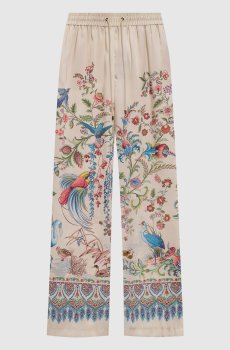 Бежевые брюки в принт
