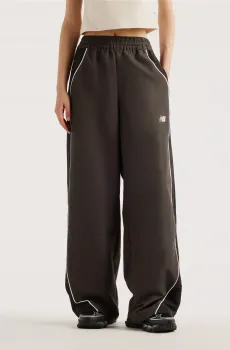 Женские спортивные брюки Trackside Woven Черный L New Balance WB62O9UFBLK