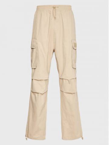 Karl Kani Штани з тканини Rubber Signature 6002506 Бежевий Relaxed Fit Karl Kani Штани з тканини Rubber Signature 6002506 Бежевий Relaxed Fit