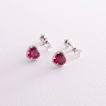 Серебряные серьги - пусеты "Сердечки" с рубином и фианитами 2713/9р-HRUB Серебряные серьги - пусеты "Сердечки" с рубином и фианитами 2713/9р-HRUB