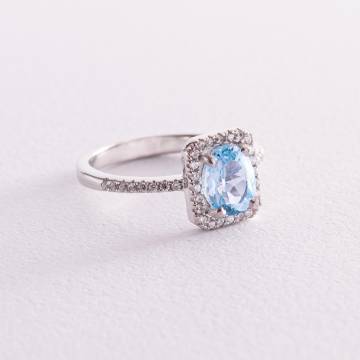 Серебряное кольцо с голубым топазом и фианитами 111474 Серебряное кольцо с голубым топазом и фианитами 111474