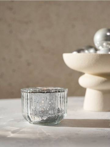 Скляний свічник - срібний