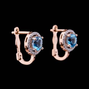 Золотые серьги с голубым топазом и фианитами с04165 Золотые серьги с голубым топазом и фианитами с04165