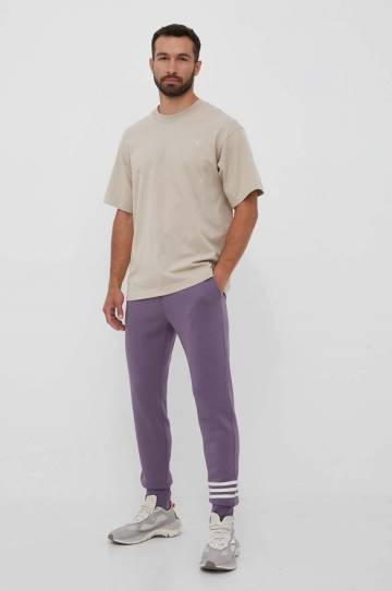 Спортивные штаны adidas Originals цвет фиолетовый с аппликацией Спортивные штаны adidas Originals цвет фиолетовый с аппликацией