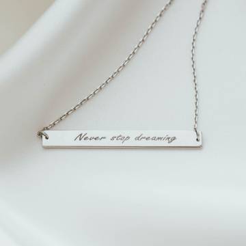 Золотой браслет с гравировкой "Never stop dreaming" б04487 Золотой браслет с гравировкой "Never stop dreaming" б04487