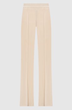 Бежевые брюки клеш с логотипом