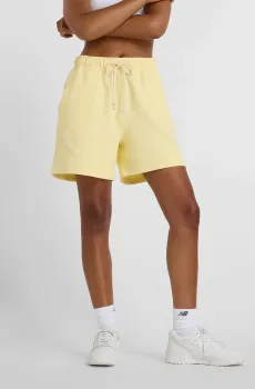 Женские желтые шорты Athletics FT Желтый S New Balance WS41508PRC