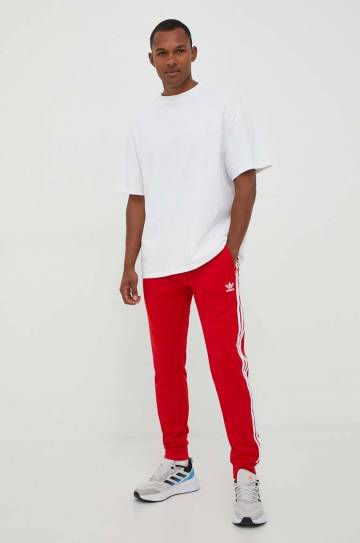 Спортивные штаны adidas Originals цвет красный с аппликацией Спортивные штаны adidas Originals цвет красный с аппликацией