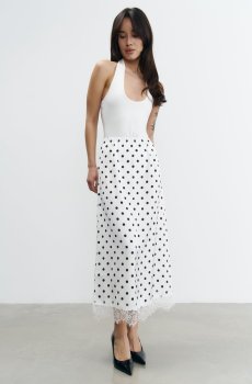 Біла сатинова спідниця міді з принтом в горох